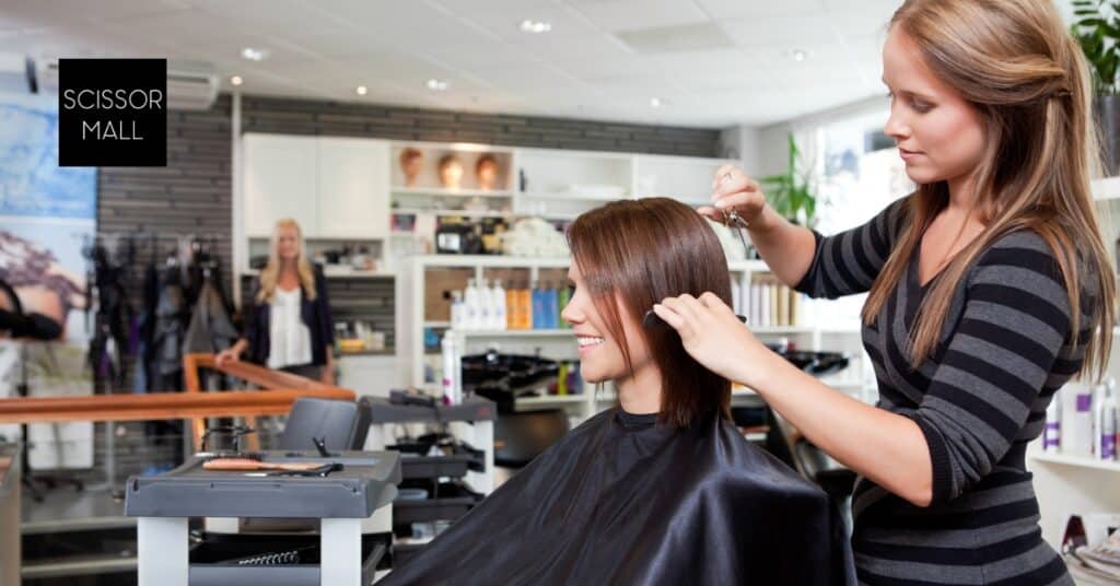 Close-up of professional hair cutting scissors on a salon workstation
