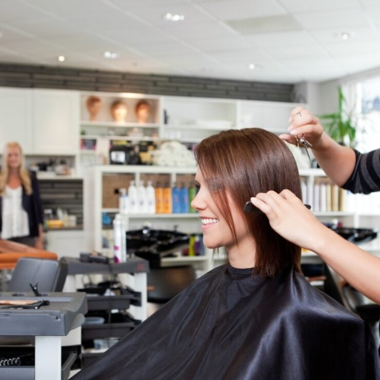 Close-up of professional hair cutting scissors on a salon workstation